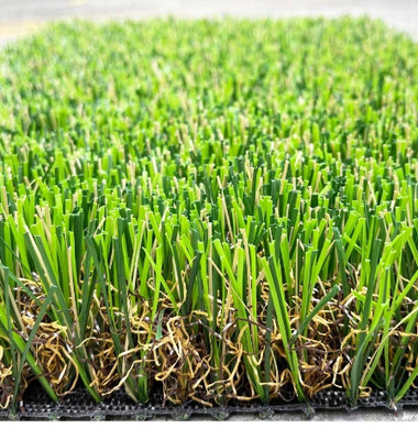 La CINA Panno artificiale di verde pp del campo di erba del giardino riccio del PPE più rete di rinforzo fornitore